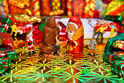 Excitement was in the air as Santa posed for his annual chocolate sculpting and painting.  - While you were sleeping...  Photography by Lon Casler Bixby - Copyright - All Rights Reserved - www.whileyouweresleeping.photography/