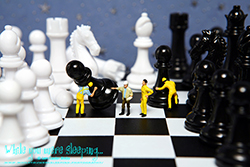 The Chess Team worked hard to set up the board, but it was obvious that the foreman had no clue where the pieces went. - While you were sleeping...  Photography by Lon Casler Bixby - Copyright - All Rights Reserved - www.whileyouweresleeping.photography/